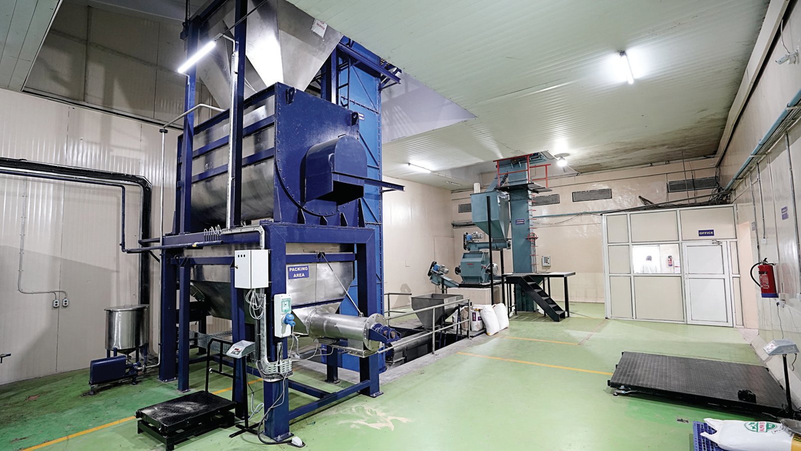 Automated batching and mixing line inside the Alpha Feeds manufacturing facility